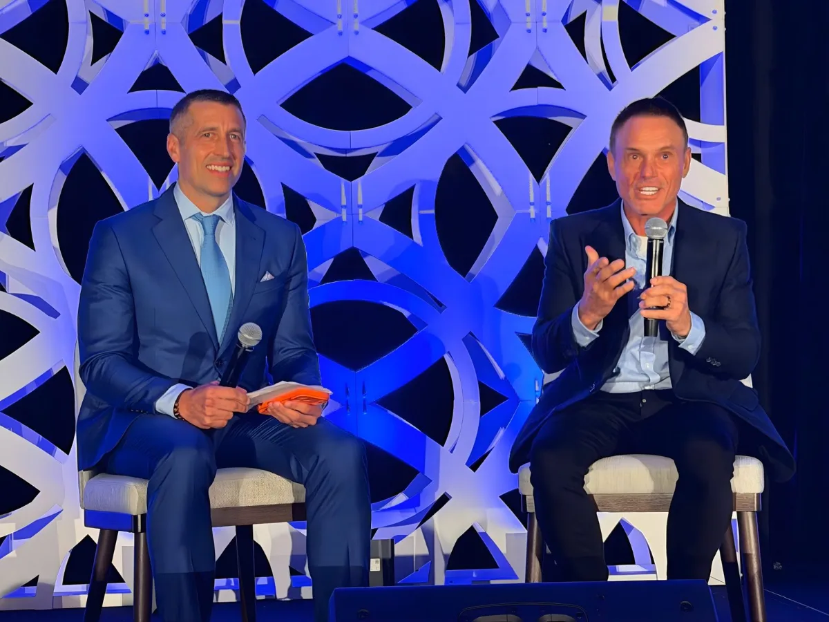 Richard C. Wilson on stage at a Family Office Club event